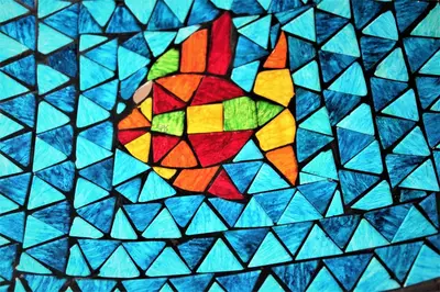 a stained glass window with a colorful fish at Central luxurious Apartment with sea view! in Chania Town