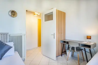 a room with a desk and a bed and a table at Central luxurious Apartment with sea view! in Chania Town
