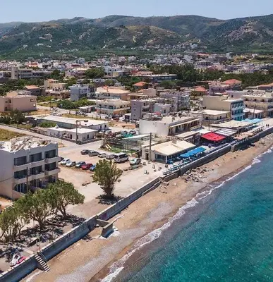an aerial view of a beach with buildings and the ocean at Beach House in Kissamos