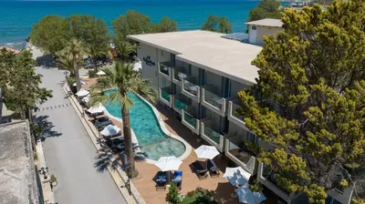 an aerial view of a hotel with a swimming pool at Kalyves Beach Hotel in Kalyves
