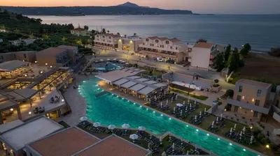 an aerial view of a resort with a swimming pool at Kiani Beach Resort Family All Inclusive in Kalyves