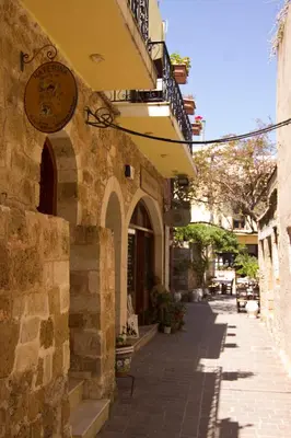 a street in a village with a building at Katerina Traditional Rooms in Chania Town