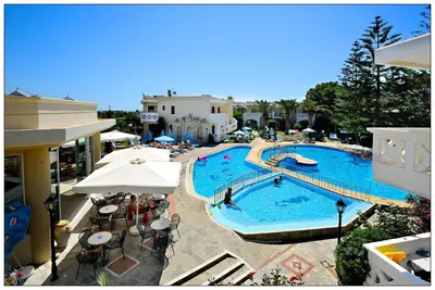an overhead view of a swimming pool at a resort at Kastalia Village ,Saint Nikolas resort in Kolymvari