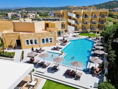 an aerial view of a hotel with a swimming pool at Sunny Bay Hotel in Kissamos