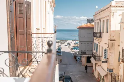 a view of a city street from a balcony at Casa Veneta in Chania Town