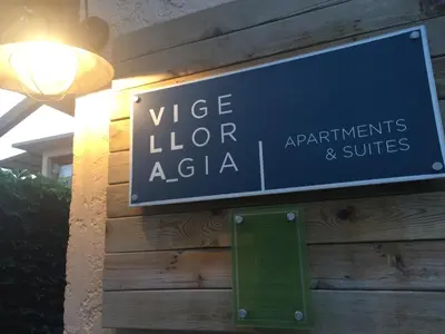 a blue sign for a vice loperzazaza sidx at Villa Georgia Apartments & Suites in Kalamaki Chanion