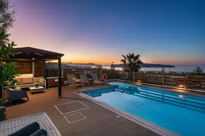 a swimming pool on the roof of a house at Seaview Garden Villa - Heated Pool & Sauna in Stalos