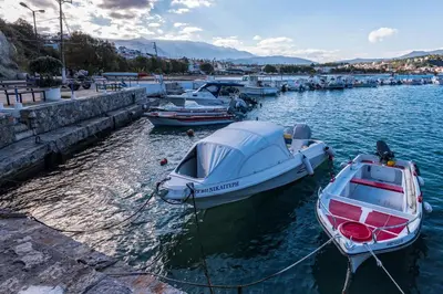 a group of boats docked in a harbor at Kalyves Maisonette Bougainvillea in Kalyves