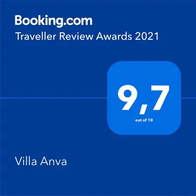 a screenshot of a phone with the travel review awards at Villa Anva in Kato Daratso