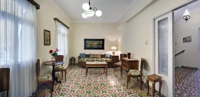 a living room with a couch and a table at Emmanouil’s House in Chania Town