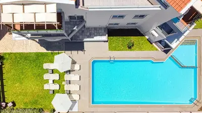 an overhead view of a swimming pool in a house at Oliva Beach Hotel in Maleme
