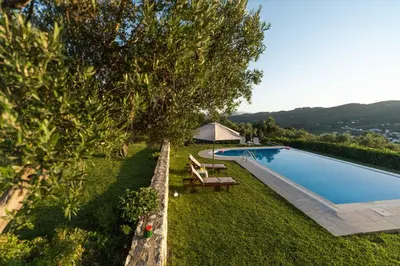 an image of a swimming pool in a yard at Rodanthi Villas in Darmarochori