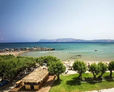 a view of a beach and the ocean at Aphrodite Beach in Kissamos