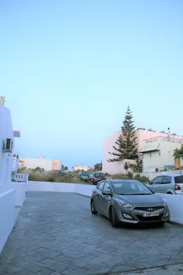 a silver car parked in a parking lot at Orama in Kato Daratso
