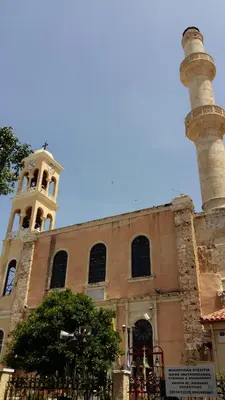a building with a clock tower on top of it at Grande Casa 1926 in Chania Town