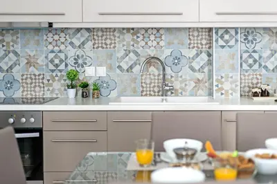 a kitchen with a sink and a table with food at Casa 1926 in Chania Town