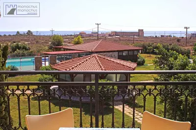 a view from the balcony of a house with a pool at Monachus Monachus in Frangokastello