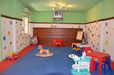 a room with many different types of toys in it at Pegasus Hotel in Stalos