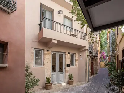 a facade of a house with a balcony at Aoria Estate Old Port in Chania Town