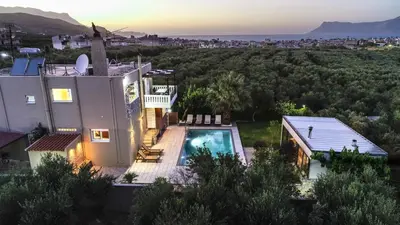 an aerial view of a house with a swimming pool at Petronila Luxury Villa with heated private pool in Kissamos
