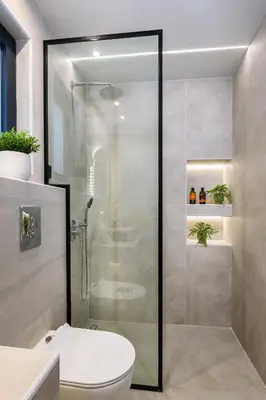 a bathroom with a shower stall and a toilet at Vintage City Apartments in Chania Town
