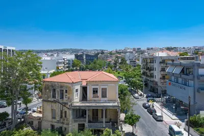 an old building on a street in a city at Aspasias Luxury Suite in Chania Town