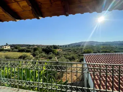 a view from the balcony of a house at Kavros House in Arménoi