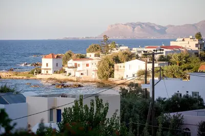 a view of a town and the ocean at Chania Sea View Summer House in Kalamaki Chanion
