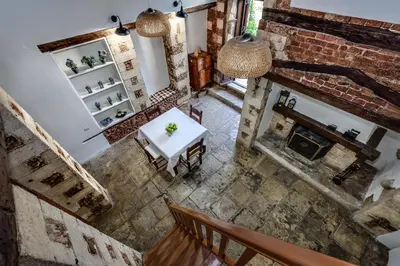 an overhead view of a living room with a table and a fireplace at Casa Veneziana in Chania Town