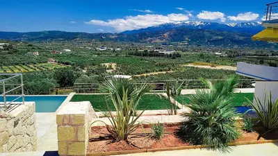 a villa with a view of the mountains at Villa Oasis in Galatás