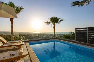 a swimming pool with a view of the city at Karmilos Hill Villa in Chania Town