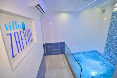 a bathroom with a water slide in a shower at Villa Zafyra in Kissamos