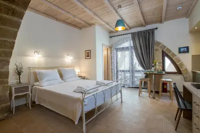 a bedroom with a large bed in a room at Villa Theta With Private Pool by Amara Living in Drapaniás