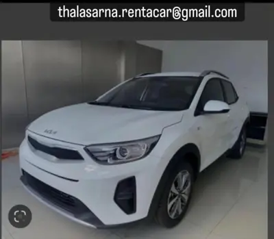 a white car parked in a garage at Kissamos View Apartment in Kissamos