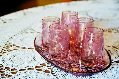 a group of glasses on a tray on a table at Minaret's View ζήστε στην αύρα της παλιάς πόλης in Chania Town