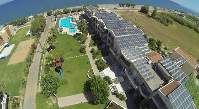 an aerial view of a building with solar panels at Maleme Mare in Maleme