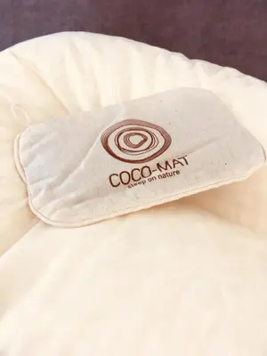 a white pillow sitting on top of a bed at Harmony House in Kissamos