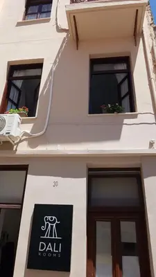 a building with a sign for ajad rooms at Dali Rooms in Chania Town