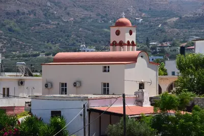 a small white building with a red roof at Sofia's view Kissamos in Kissamos