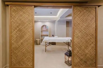 a view of a room with a table through a door at Evexia Boutique Hotel & Spa in Agia Marina Nea Kydonias