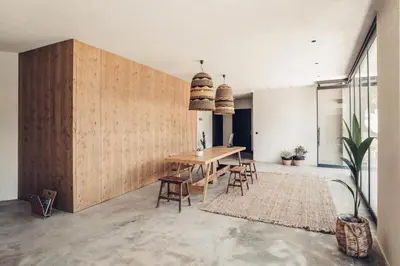 a dining room with a table and chairs at Monastery Estate Retreat in Sougia