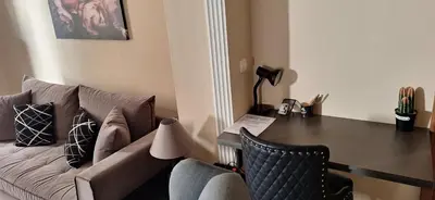 a living room with a couch and a table at Modern Apartment Chania Center in Chania Town