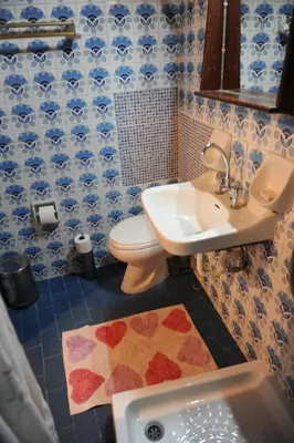 a bathroom with a toilet and a sink at Eleonora in Chania Town