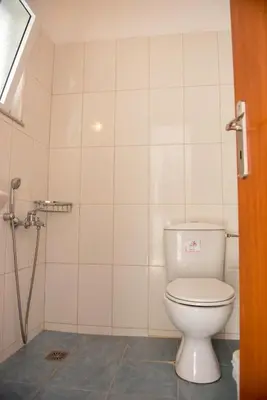 a bathroom with a toilet and a shower at Sifis Studios in Palaiochóra
