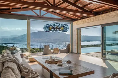 a living room with a couch and a table at Elements Villa in Galangádhos