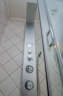 a shower in a bathroom with a glass door at Pilot Lux Apartment in Chania Town