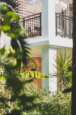 a building with plants in front of it at Dionyssos Village in Kato Daratso