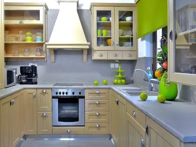 a kitchen with wooden cabinets and a sink at Private Pool & Garden Villa for 6 in Pemónia