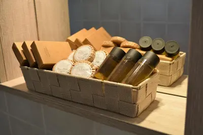 two containers sitting on top of a shelf at Raph's Studios-Apts By The Sea in Agia Marina Nea Kydonias