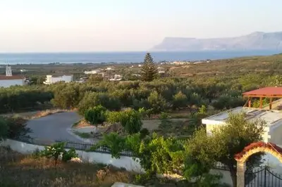 a view of a river with mountains in the background at Wood & Stone in Kissamos